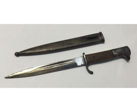 A Ks98 German bayonet, completely devoid of a makers mark or date, but seemingly a ‘parade’ issue piece, with a nickel plated