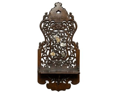 JAPANESE CARVED WALL BRACKET, c. 1920, pierced foliate back applied with a bird and flowers in mother-of-pearl and bone, 60cm