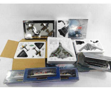 A Corgi die cast set The RAF At War, Fighting Machines, Showcase Collection, boxed, together with Atlas die cast military aer