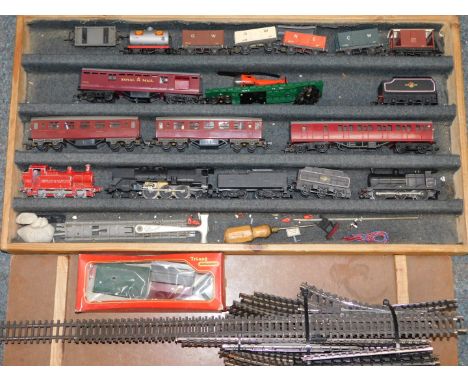 A Joueff OO gauge locomotive and tender, black livery, Hornby engine, further engine, coaches and wagons, track and a control