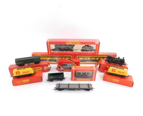 An Hornby OO gauge B12/3 locomotive, LNER green livery, 4-6-0, 8579, R284, two GWR coaches, a Hornby shunting engine, BR blac