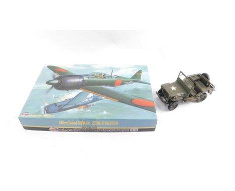 A Haseqawa Hobby Kits Mitsubishi A6M5C0 Fighter, ST4, boxed, together with a model of an American Jeep, scale 1:24. (2)