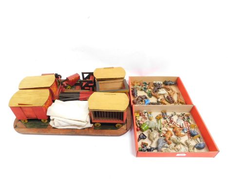 Charbens painted lead circus figures, zoo animals, together with scratch built zoo/circus wagons, clockwork cars and an arena