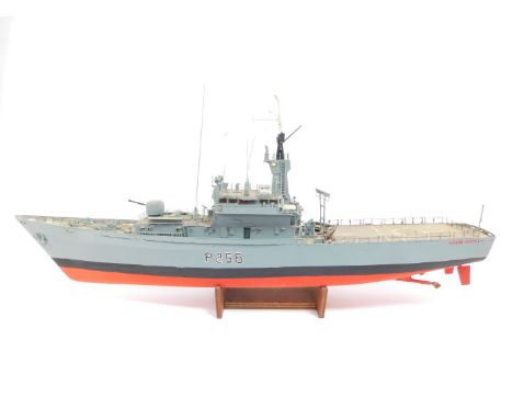 A scale model of HMS Leeds Castle, B258, a Castle Class Patrol Ship, on a wooden stand, 104cm L..