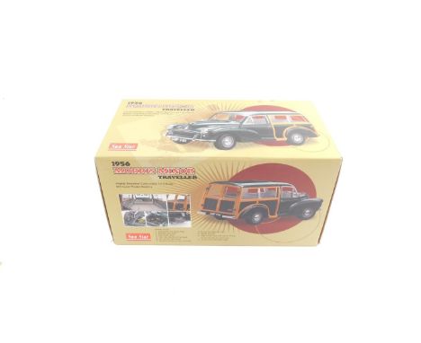 A Sun Star die cast model of a 1956 Morris Minor Traveller, scale 1:12, boxed.