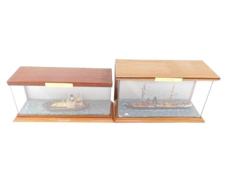 Two scale shipping models, comprising The SS Iberia and a tug St. Denys, both cased, 29cm W and 31cm W respectively.