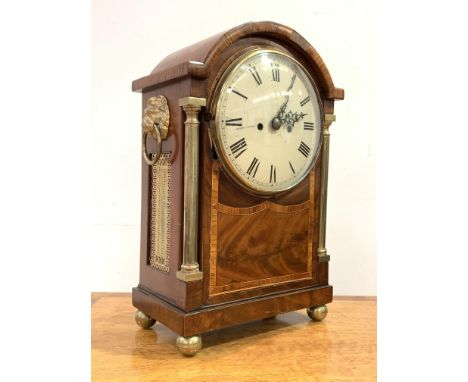 A Regency period and later bracket clock, the mahogany and rosewood case with satinwood banding having brass pilasters, gilt 