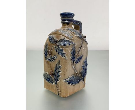 An unusual stoneware Scotch Whisky decanter, late 19th century, probably Doulton Lambeth, of square section, decorated in rel