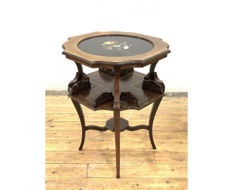 An Edwardian rosewood book table, the serpentine top centred by a Pietra Dura panel, inlaid with lapis lazuli and other speci