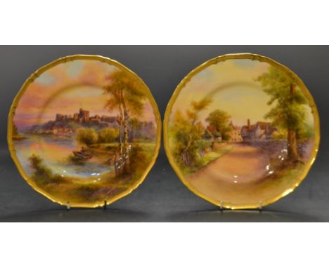 A Royal Worcester shaped circular plate, painted by R Rushton, signed, with Windsor Castle, tooled gilt  banded border, 27cm 