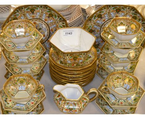 A Noritake 12 piece setting tea service including, cups, saucers, bowls, etc decorated with a geometric floral pattern, blue 