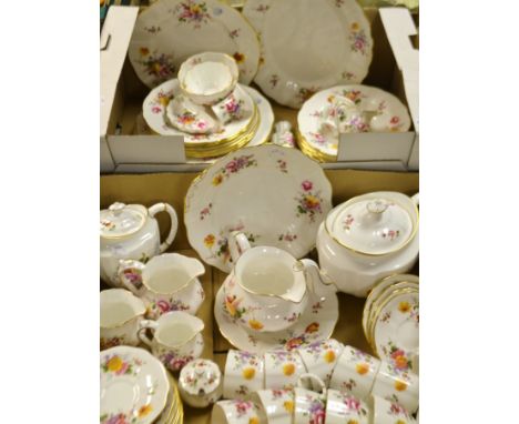 A Royal Crown Derby Posie tea service comprising teapot, cake plate, cups and saucers, tea plates, milk jug and sugar bowl;  