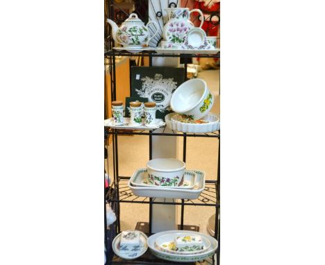A Portmeirion Botanic Garden teapot;  a large Portmeirion Botanic Gardens flan dish, another smaller; jug;  place mats etc 