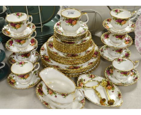 A Royal Albert Old Country Roses dinner service comprising, six dinner plates, six side plates, gravy boat, cups and saucers,