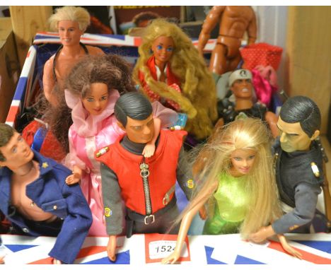 A Dan Dare toy gun;  Captain Black talking figure;  a 1960's action man in an army outfit;  a rifle rack containing guns;  a 