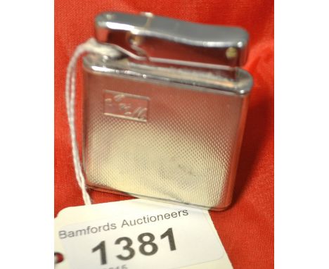 A silver Colibzi lighter 