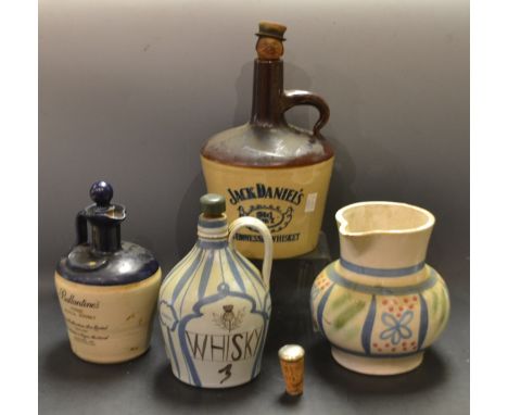 A Ballantines Finest Scotch Whisky bottle;  Jack Daniel's whisky bottle;  a Buchan whisky stoneware bottle etc (4)