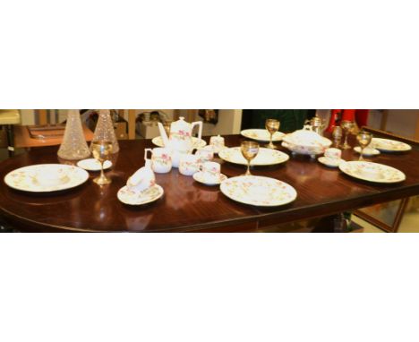 An Abbeydale floral printed dinner service, comprising vegetable dish and cover, sauce boat on stand, six dinner plates, five