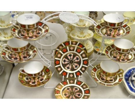 A Royal Crown Derby 1128 pattern tea set, comprising six cups, six saucers, five side plates