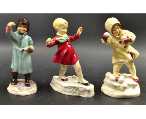 A Royal Worcester figure February, no 3453, designed by Freda Doughty; others January and December painted marks (3)  