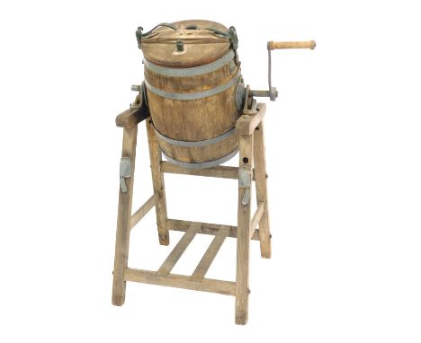 A Dairy Society Company Limited butter churn, 108cm high. 