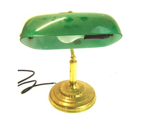 A 20thC brass desk lamp, with green glass shade on circular base, 29cm high.