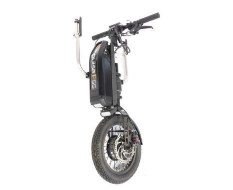 A Sun Rise Medical Empulse F55 wheelchair powered pulling device, with instruction manual. 