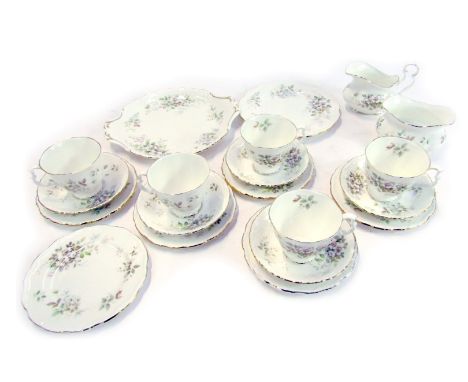 A Royal Albert Haworth pattern porcelain part tea service, comprising five cups and saucers, six side plates, one cake plate,