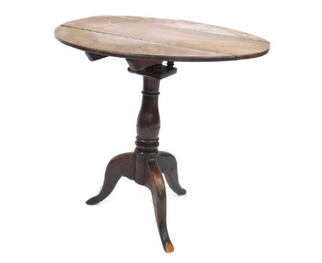 An 18thC oak tripod table, with bird cage support, on cabriole legs, 69cm high, 70cm diameter. (AF) 