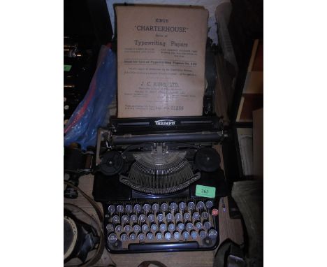 Vintage Triumph manual typewriter, which appears to be of German origin Nuremberg together with 2 sealed packages of Kings Ch