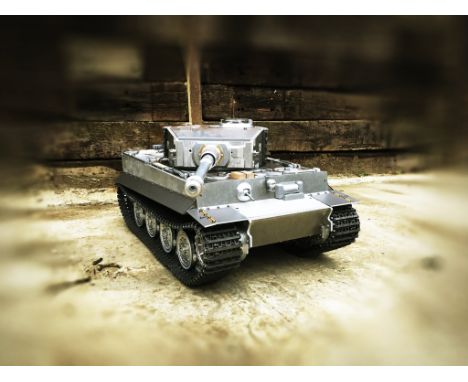 A unique opportunity to purchase an  ARMORTEK TANK (unmade)  - 4 large boxes of tank parts of 1/6th scale being a Tiger Tank 