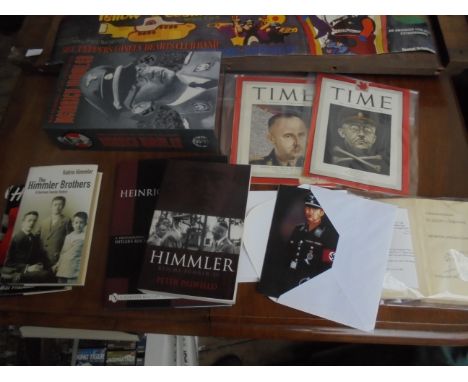 Superb collection of items relating to Heinrich Himmler comprising 'IN THE PAST' model sealed packaged 12" War Criminals of t