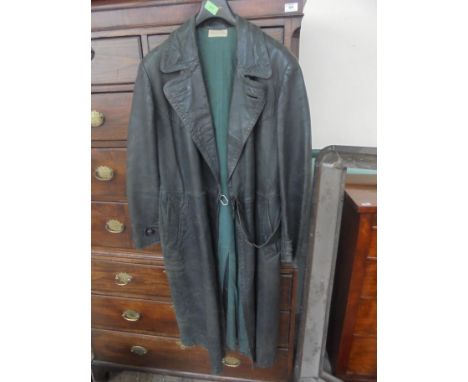 A superb item being a German/Austrian full length leather trench coat in dark green in generally v.g.c, possibly German World