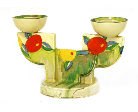 A Clarice Cliff 'Delecia Citrus' twin-branch candlestick, shape no. 609, printed 'Bizarre' mark, 21.5cm wide