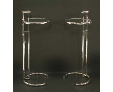 A pair of Eileen Gray-style adjustable lamp tables, after the E1027 design, each with a glass adjustable top, 32cm diameter (