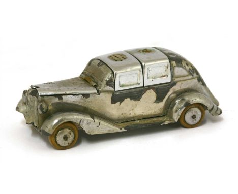 A silver-plated condiment set, in the form of a streamlined saloon car, stamped 'FOREIGN' , 11.5cm long