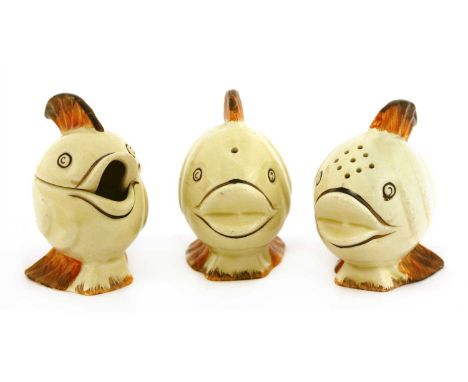 A Clarice Cliff novelty cruet set, each piece modelled as a fish, printed 'Wilkinson Ltd., England', 6.5cm high (3)
