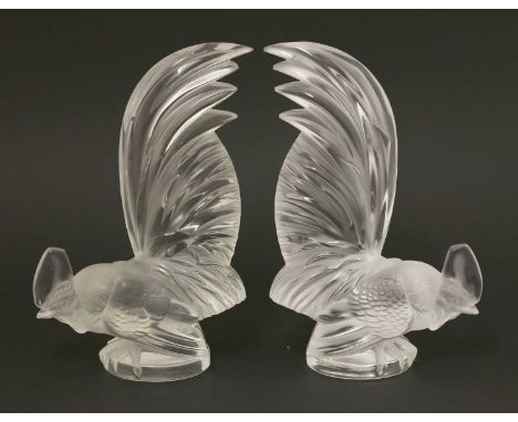 Two Lalique 'Coq Nain' glass car mascots, one inscribed 'Lalique France', and labelled 'Cristal Lalique Paris', the other 'R.