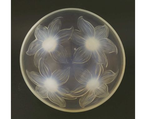 A Lalique 'Lys' glass opalescent bowl, no. 382, the body with four lily flower heads forming the feet, moulded mark 'R Laliqu