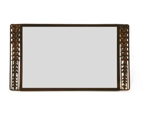 A French iron mirror, with a bevelled central plate, flanked with maple leaf panels, 110cm wide 63.5cm high