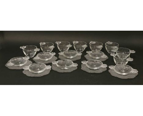 A collection of Lalique 'Honfleur' glassware, comprising: 8 dishes, 15cm diameter, 8 shallow bowls, 15cm wide, 8 deep bowls, 