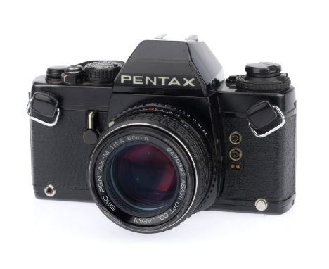 A Pentax LX 35mm SLR Camera, black, serial number 5240747, body G minor usage marks and small dent to prism cover and wear ma