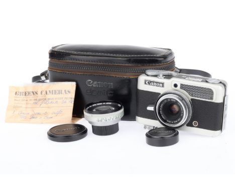 A Canon Demi C 35mm Half Frame Camera, silver, serial number 118382, body G, shutter works, iris works, light meter responds,