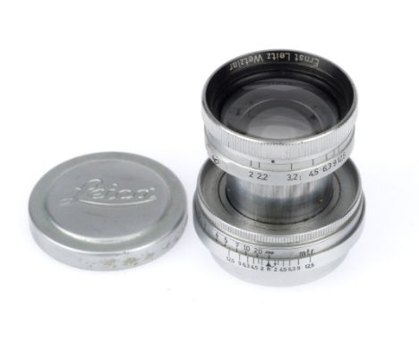 A Leitz Wetzlar Summitar f/2 5cm Camera Lens, chrome, serial number 489243, barrel G, focus is smooth, iris function is stiff
