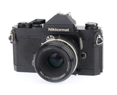 A Nikon Nikkormat FT3 SLR Camera, black, serial number 6116547, body G, shutter working, meter responds to light livels, with