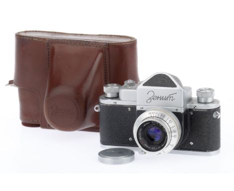 A Krasnogorsk Zenit (K1020) SLR Camera, silver, serial number 545249, body G, light marks to bottom plate, shutter working, w