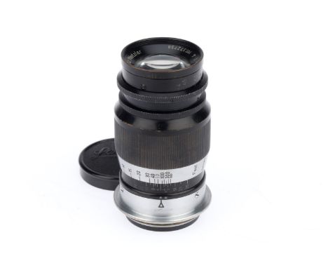 A Leitz Wetzlar Elmar f/4 9cm lens, black, serial number 372798, barrel G, optics G with light haze.