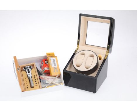 A Selection of Watchmakers' Tools, to include a micro socket set, pin pliers, miniature screwdrivers, a case holder, some wat