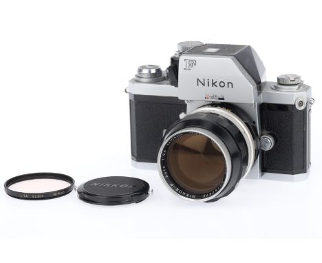A Nikon F Photomic 35mm SLR Camera, silver, serial number 6942179, body G, light marks to bottom plate, shutter working, view