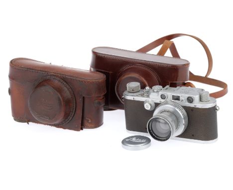 A Leica IIIa Rangefinder Camera, silver, serial number 220067, body G, light marks to bottom plate, rangefinder visible and w